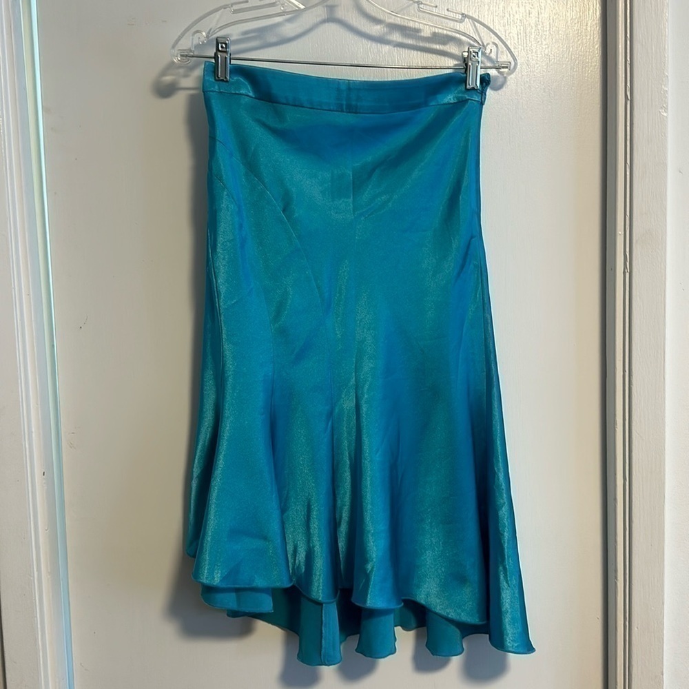 002- BNWT  Le Chateau satin affects skirt knee length. Size 1/2.